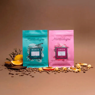 Two coffee bags from Montalegre on a brown background with coffee beans and fruits.