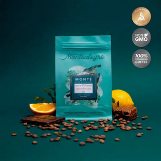 Montealegre coffee package with coffee beans and chocolate on a teal background